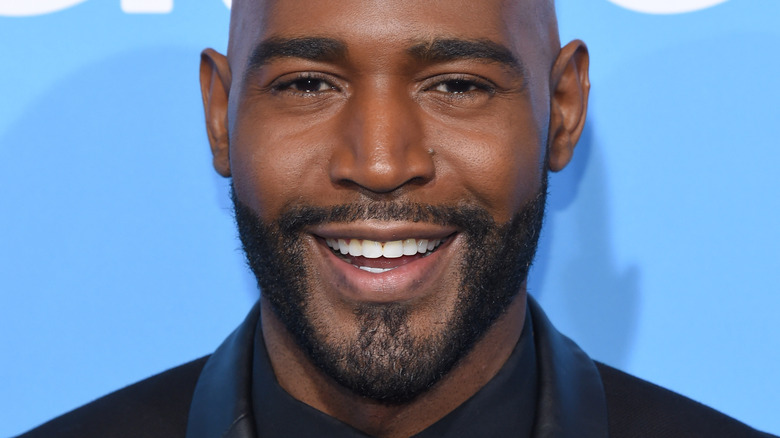 Karamo Brown smiling