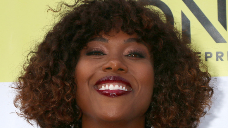 DeWanda Wise grinning broadly 