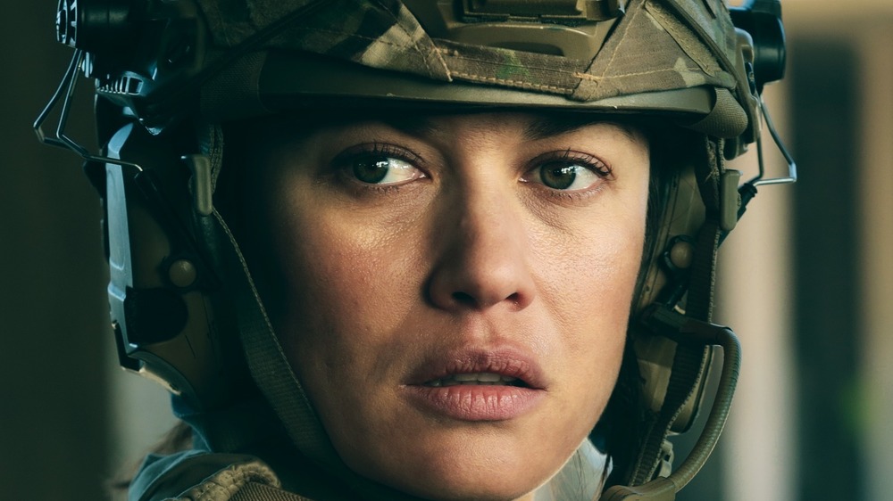 Olga Kurylenko solider uniform