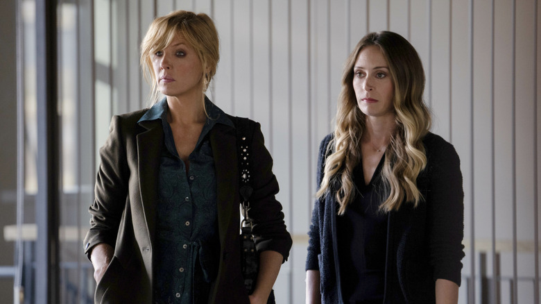 Beth and her assistant glaring