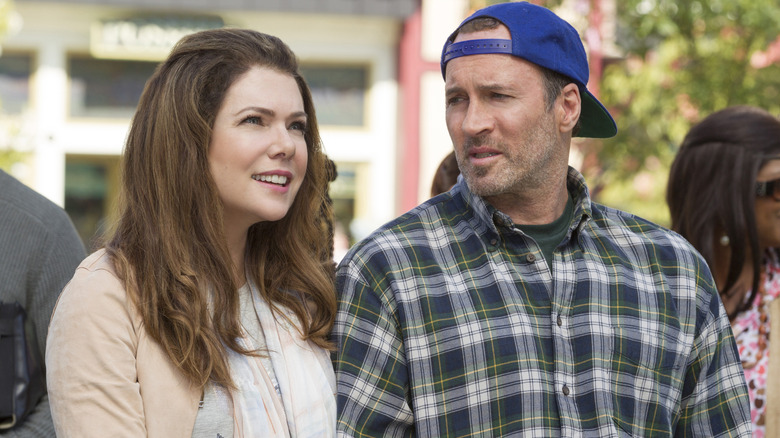 Lorelai Gilmore stands next to Luke Danes outside in Gilmore Girls: A Year in the Life (2016)