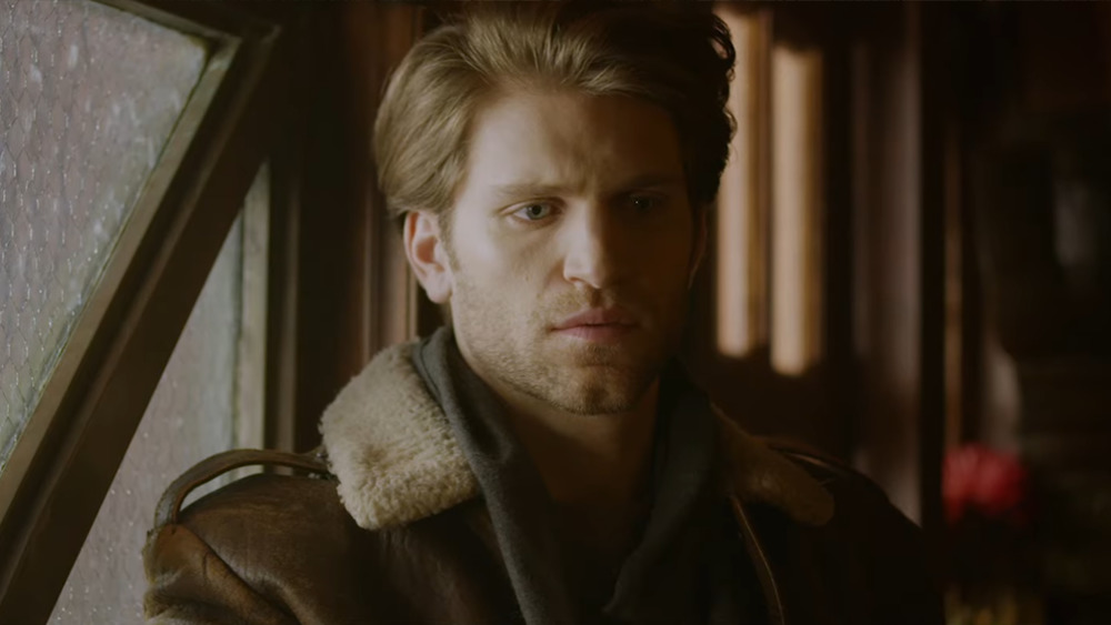 Keegan Allen wearing leather jacket