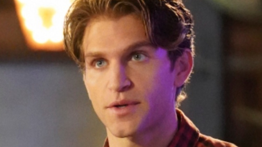 Keegan Allen in a bar