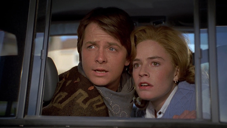 Michael J. Fox as Marty McFly and Elizabeth Shue as Jennifer Parker in Back to the Future Part III