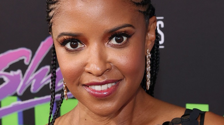 Renée Elise Goldsberry smiles