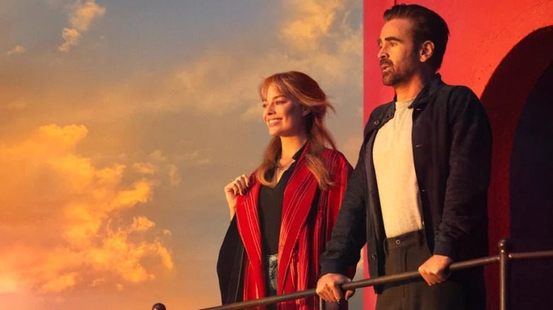 Sarah and David on a lighthouse railing in A Big Bold Beautiful Journey (2025)