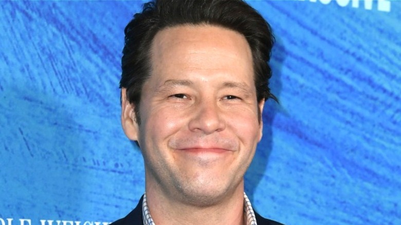 Ike Barinholtz smiling