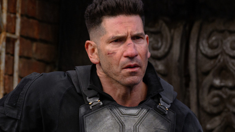 Frank Castle, The Punisher, walking down an alley with a scowl in Spider-Man: Brand New day (2026)