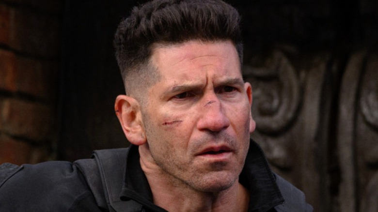Frank Castle, The Punisher, walking down an alley with a scowl in Spider-Man: Brand New day (2026)