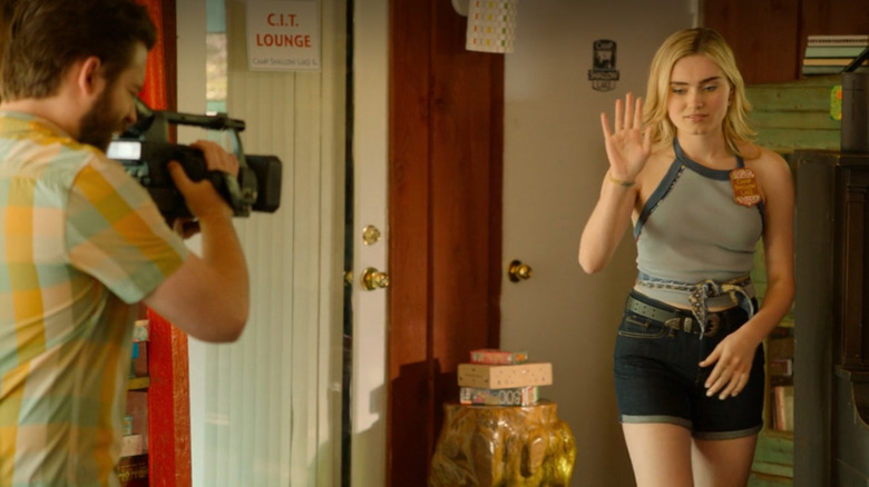 Val is video taped with her hand up in High School Musical: The Musical: The Series