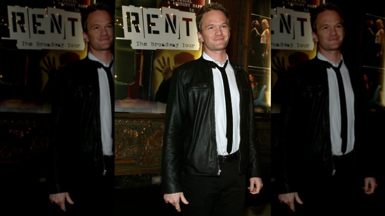 Neil Patrick Harris in front of Rent poster