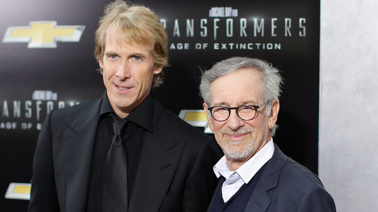 Michael Bay and Steven Spielberg posing together at 2014's Transformers: Age of Extinction premiere