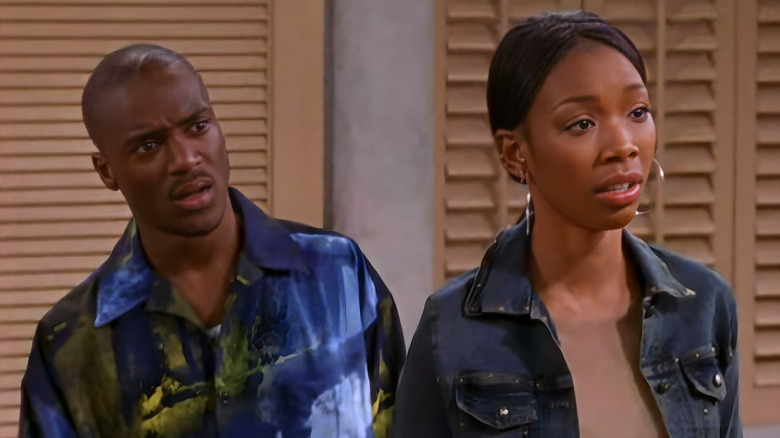Dorian Long and Moesha Mitchell looking scared