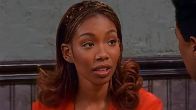 Moesha Mitchell talking red blouse