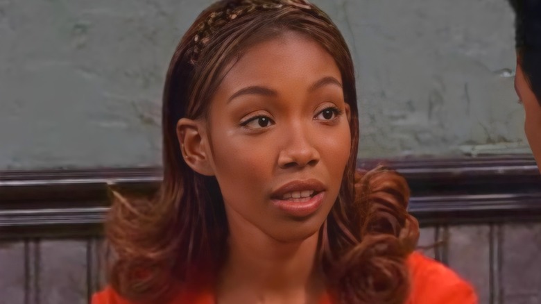 Moesha Mitchell talking red blouse