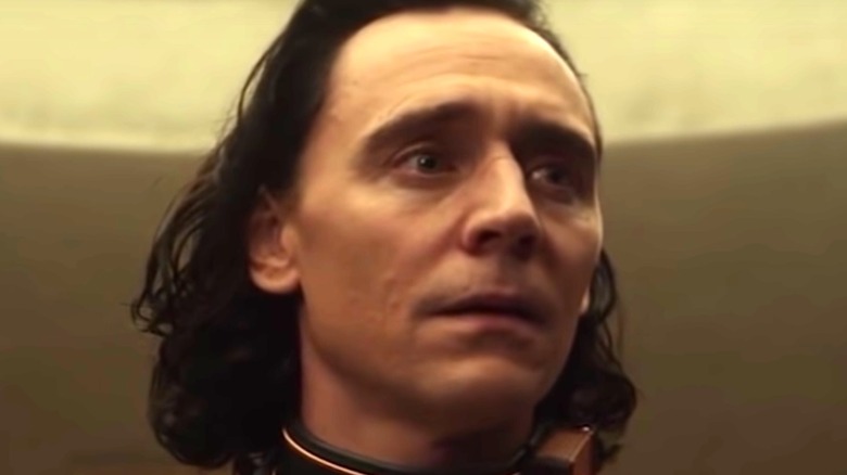 Loki looks concerned and scared