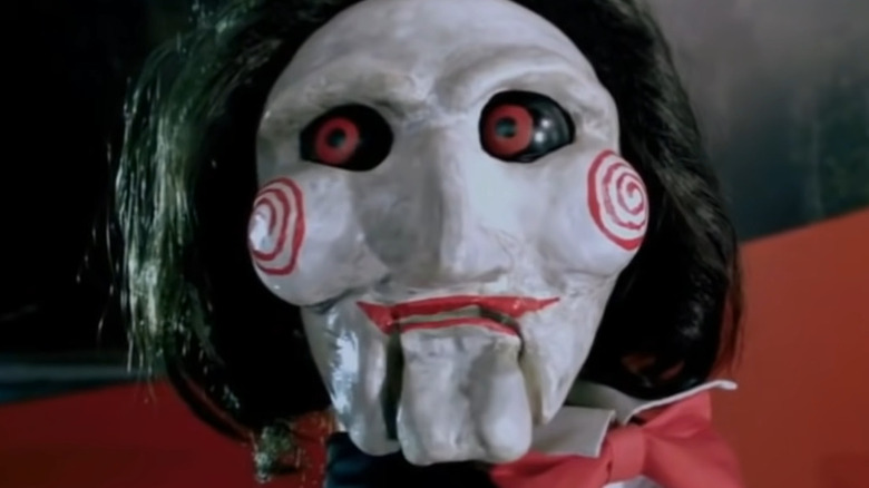 Billy the Puppet smirking