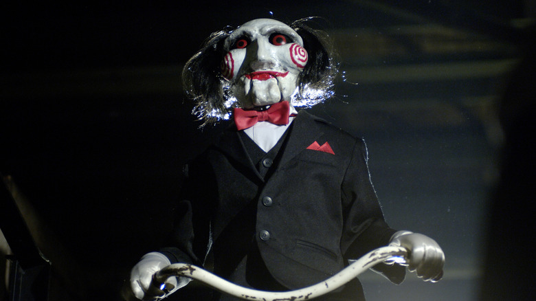 Billy the Puppet smirking
