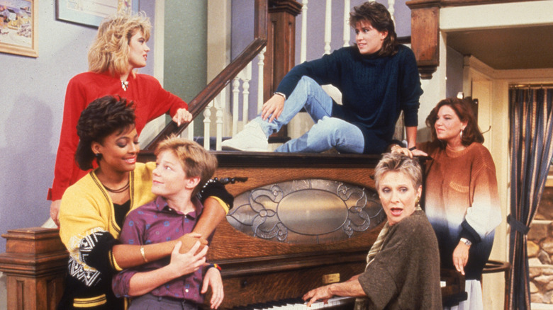 Cloris Leachman playing the piano with the girls (and one boy, Andy) surrounding her