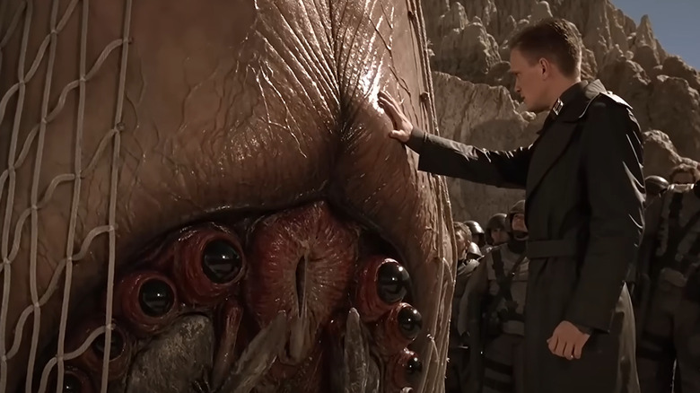 Carl touches the bug