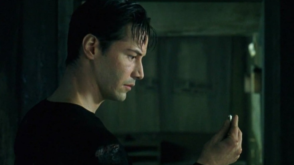 Neo looking at a bullet