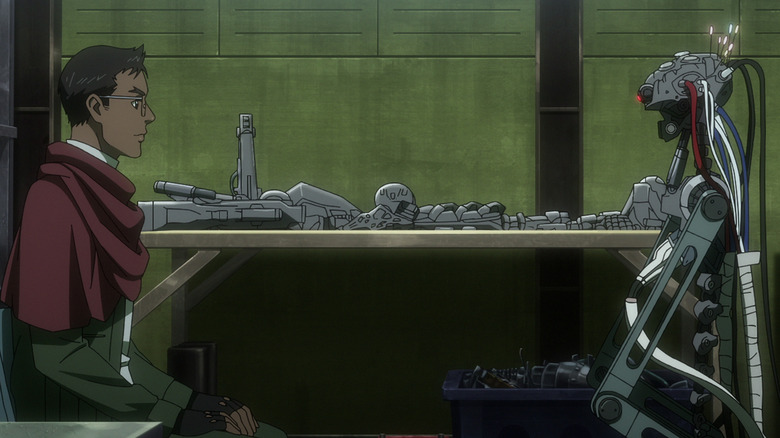 Malcolm sitting across from a dismantled Terminator in "Terminator Zero" (2024)