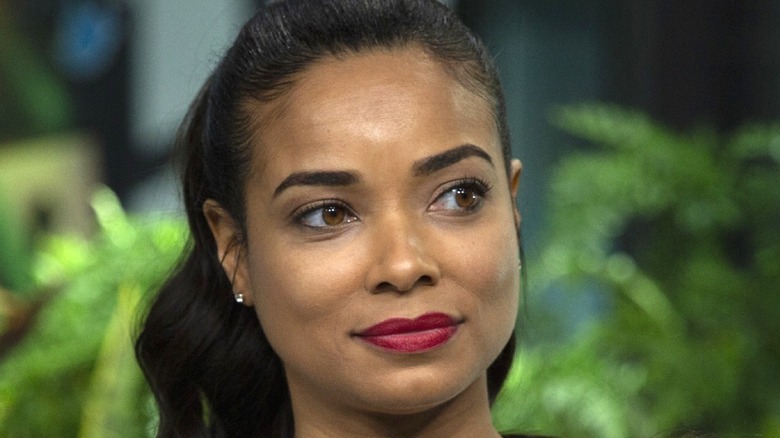 Rochelle Aytes wearing red lipstick 