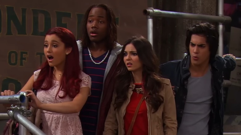 Ariana Grande as Cat, Leon Thomas III as André, Victoria Justice as Tori, and Avan Jogia as Beck, all looking shocked and upset on "Victorious"
