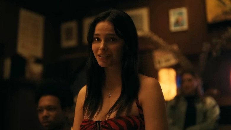 Nikki creepily smiling in Obsession
