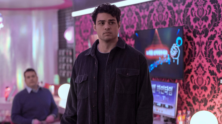 Owen standing in office in "The Recruit"