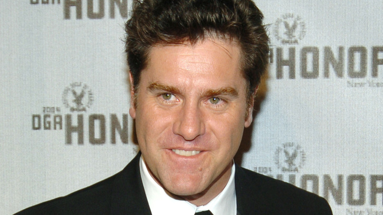 David Keeley smiling in a suit