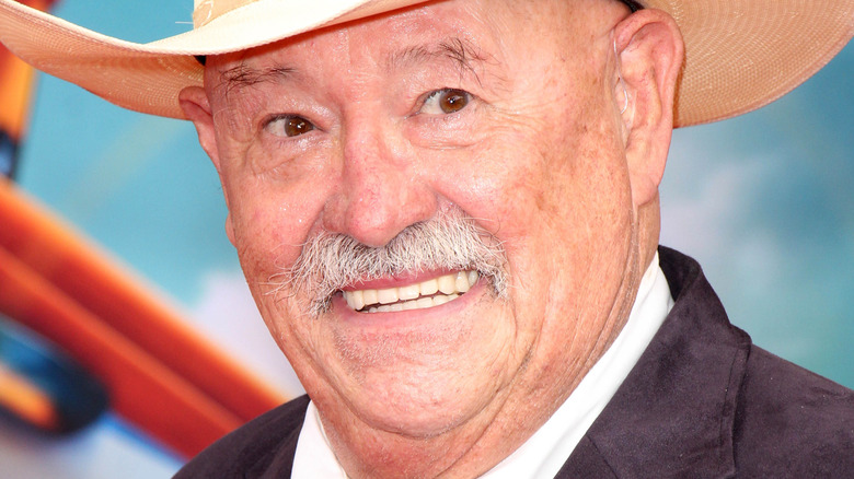 Barry Corbin smiling at event wearing a cowboy hat