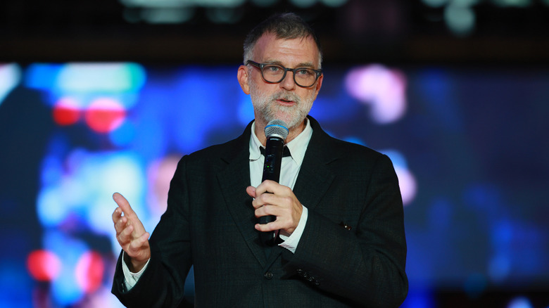Paul Thomas Anderso speaking on stage with microphone
