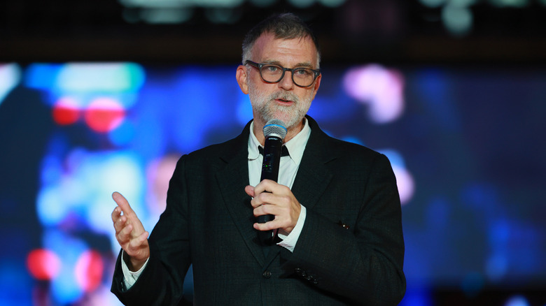 Paul Thomas Anderso speaking on stage with microphone