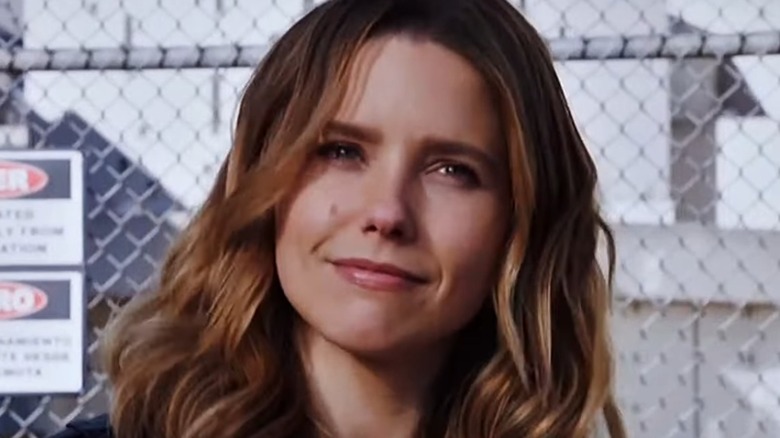 Erin Lindsay smiling wryly