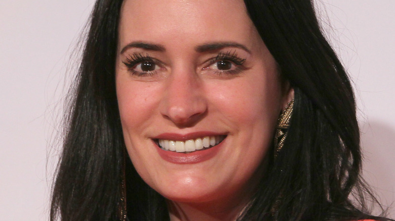 Paget Brewster smiling