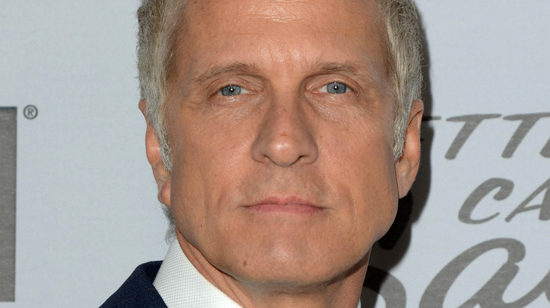 Patrick Fabian looking pleased with himself on a red carpet