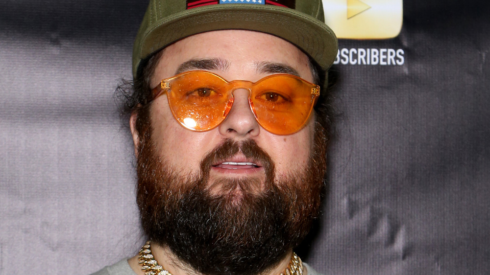 Chumlee hat orange glasses