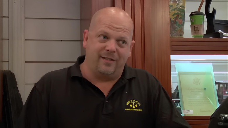 Rick Harrison behind counter