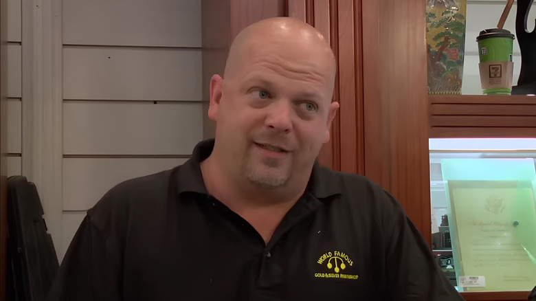Rick Harrison behind counter