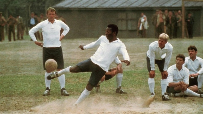 Pele kicking a ball