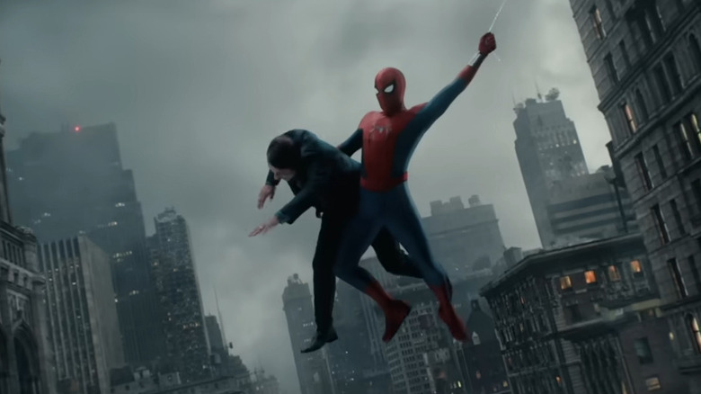 Spider-Man swinging while carrying a person in Spider-Man: Brand New Day