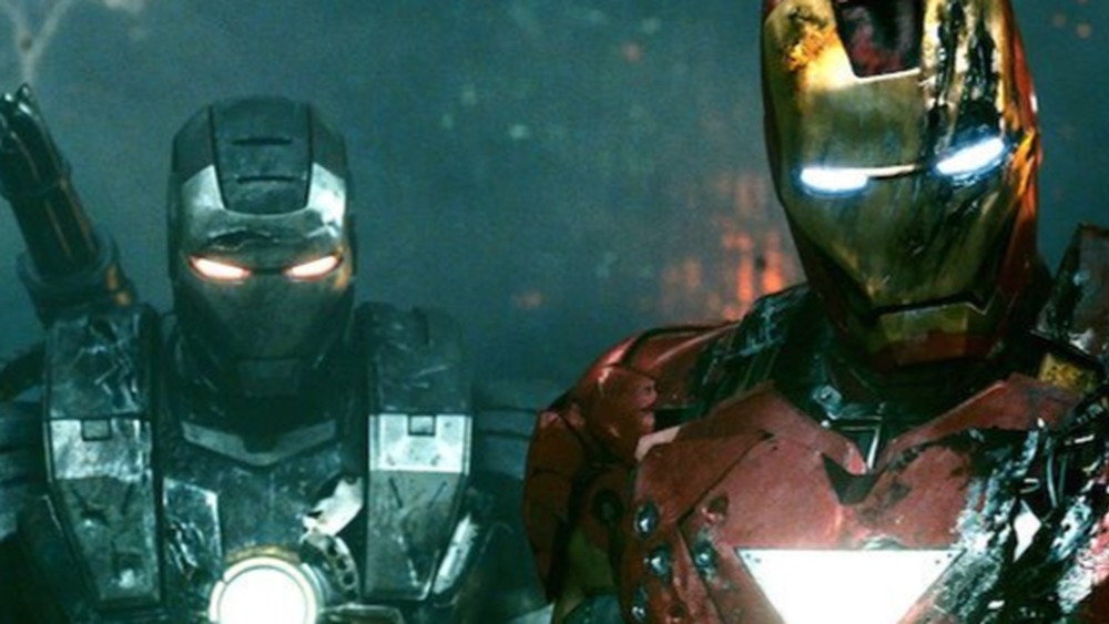 Don Cheadle as James Rhodes/War Machine and Robert Downey Jr. as Tony Stark/Iron Man in Iron Man 2