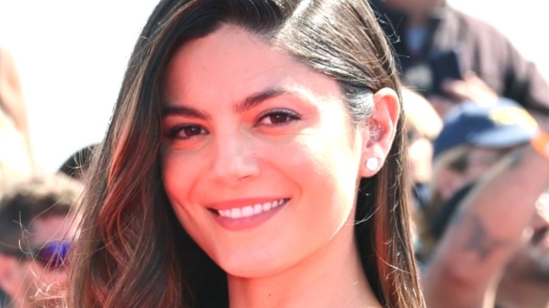 Monica Barbaro smiling