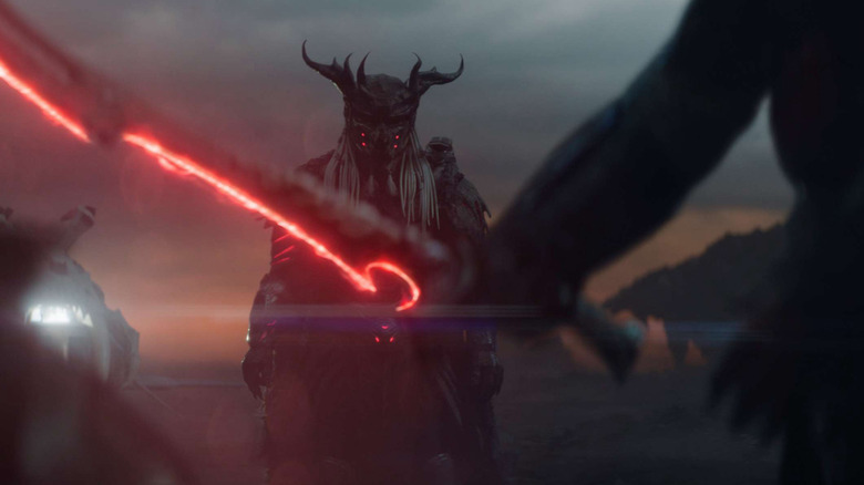 Kwei preparing to fight his father in Predator: Badlands (2025)