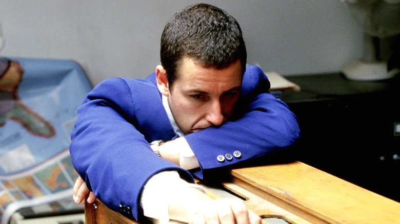 Adam Sandler broods