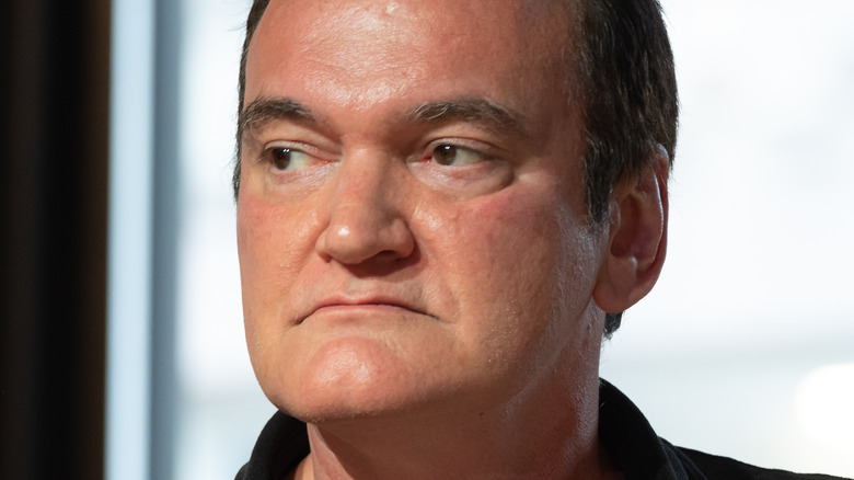 Quentin Tarantino looking to his right
