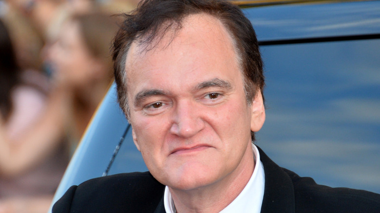 Quentin Tarantino waving