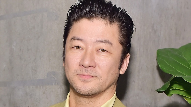 Tadanobu Asano looking at the camera