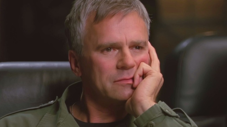 Col. Jack O'Neill sits for a briefing in "Stargate: SG1" (1997-2007)